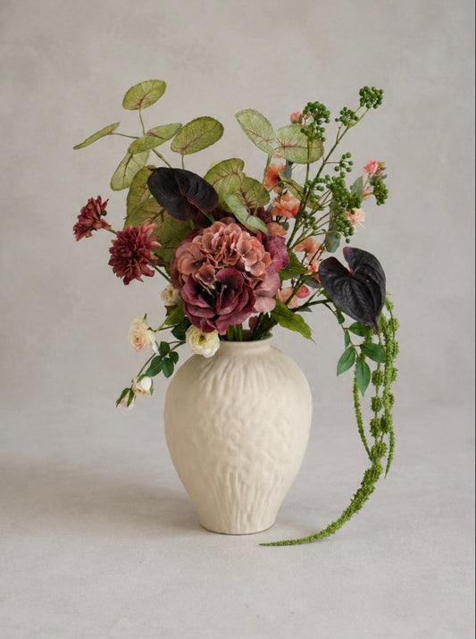 Modern Floral arrangement in a textured white vase by Best and Bloom