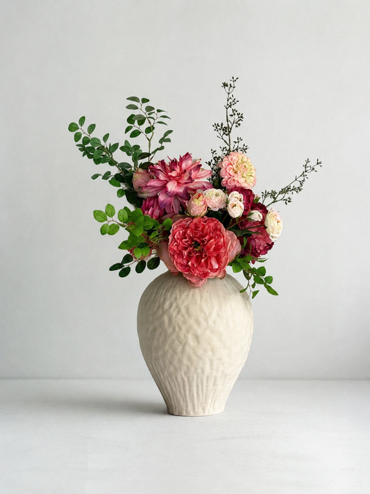 Red Artificial Flowers in a Large Textured Ceramic Vase White Cream Neutral